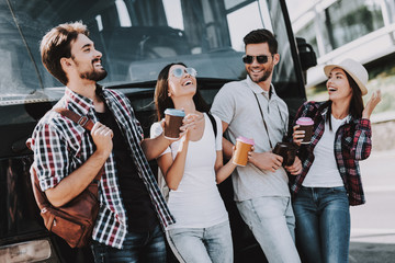 Sticker - Young People Drinking Coffe in front of Tour Bus