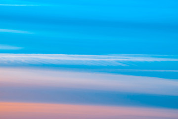 Wall Mural - varicolored striped surreal sky with shades of blue, cyan, cobalt, pink colors. horizontal lines of 