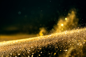 Wall Mural - glitter lights grunge background, gold glitter defocused abstract twinkly lights background.