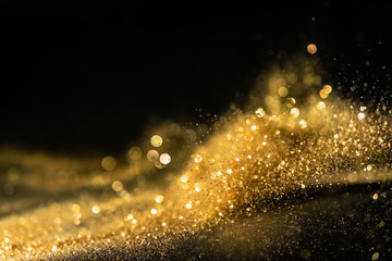 Wall Mural - glitter lights grunge background, gold glitter defocused abstract twinkly lights background.