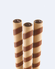 Poster - crispy cream filled wafer Roll sticks With Cocoa or Chocolate isolated on white background.