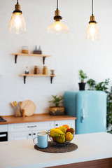 Stylish kitchen interior with dining table and chairs