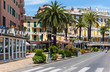 Hotels and street cafes at the Lungomare Vittorio Veneto at the port of Rapallo, Italian Riviera