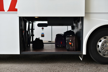 Wall Mural - luggage and bags in big white bus