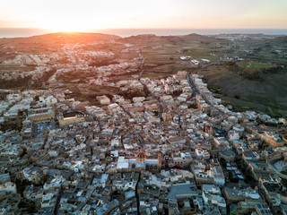 Sticker - Aerial drone photo - Sunset over the city of Victoria (Rabat).  Island of Gozo, Malta.  