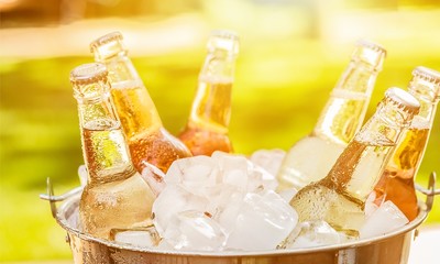 Sticker - Bottles of cold and fresh beer with ice isolated