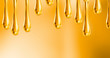 liquid drops of motorcycle oil on orange background