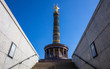 Victory column in Berlin, Germany, blue sky, low angle.