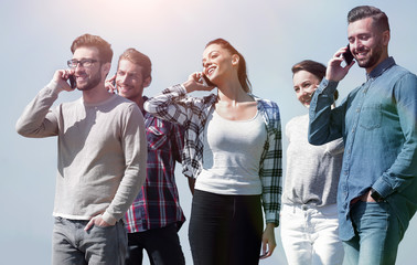 Canvas Print - group of young people with smartphones