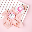 © igishevamaria - Cup of coffee on white wooden serving tray and alarm clock. Flat lay, top view.