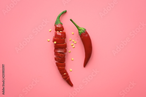 Sliced Red Chili Pepper on pink background Canvas Print