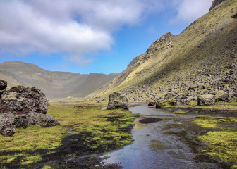 Breathtaking landscape of the great fissure of volcanic canyon Eldgja, sunny blue sky in central Iceland, Europe