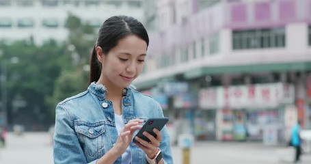 Canvas Print - Woman use of mobile phone in the street