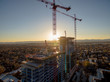 © nick - Sunset over construction cranes in Denver, Colorado