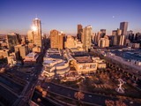 Fototapeta Miasto - An aerial view of the skyline of the city of Denver at sunset