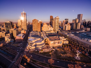 An aerial view of the skyline of the city of Denver at sunset