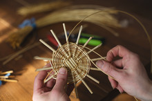 Basketwork From Willow Twigs In The Workshop.