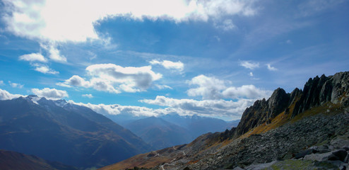 Poster - wild and picturesque mountain landscape in the Swiss Alps on a beautiful day in late autumn with mountains and a great view