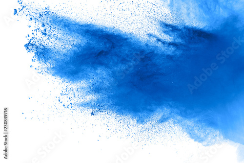 Bizarre forms of  blue powder explode cloud on background. Launched blue dust...
