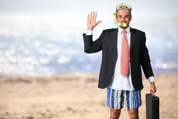 Poster - Smiling handsome businessman wearing diving mask, preparing