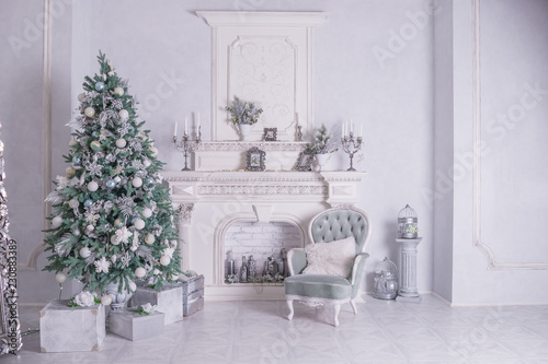 Christmas holiday background. Christmas tree with silver and