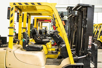 Forklifts in warehouse