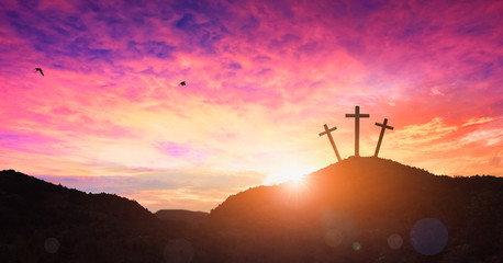 Wall Mural - Christmas concept: Crucifixion Of Jesus Christ Cross At Sunset