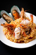 © topntp - risotto with seafoods (shrimps, mussels, octopus, clams) and tomatoes