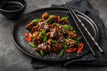 Canvas Print - sweet sticky pork served with chives and  sesame seeds