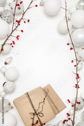 Fotografia, Obraz Christmas white wood background with bauble and red berries