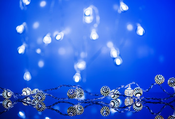 Christmas background pattern with lights of garland