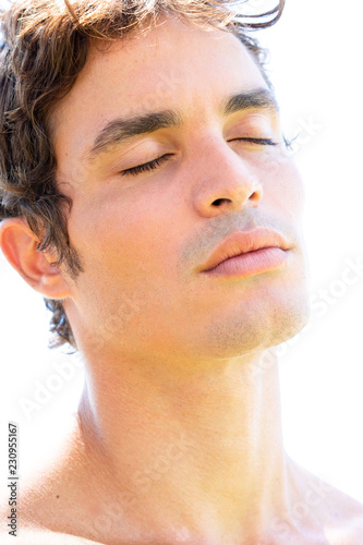 Portrait Of Sexy Bare Chested Man With Black Hair And Strong