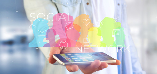 Poster - Businessman holding a colorfull social network teamwork with icon 3d rendering