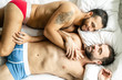 A Handsome gay men couple on bed together