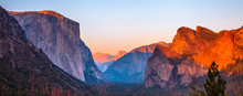 Yosemite National Park Tunnel View Overlook At Sunset. Front View Panorama Of Popular El Capitan And Half Dome At Deep Red Sunset. Summer American Holidays. California, United States.