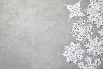 composition with beautiful snowflakes and space for text on color background, top view. festive wint