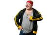 Funny picture of chubby cheerful caucasian man dressed in sport black jacket with red headband, making OKey gesture and isolated over white background with copyspace.