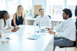 © alfa27 - positive ambitious office workers having fun at workplace in the room with panorama window. education concept