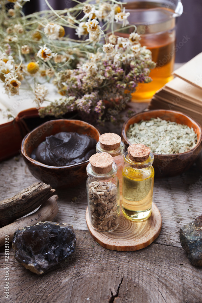 Stock Foto Natural herbal skin care products top view ingredients. Cosmetic oil clay sea salt herbs plant leaves. Facial treatment preparation background skincare spa closeup Adobe Stock