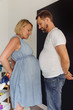 © Westend61 - Pregnant woman and her husband comparing their bellies