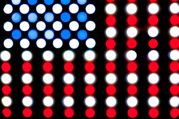 Detail of blurred led lights forming a bright glowing american flag