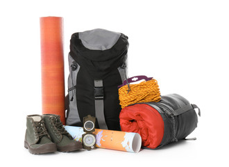 set of camping equipment with sleeping bag on white background