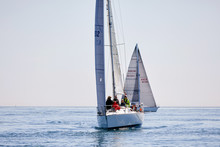 Sailboat Racing On A Sunny Day