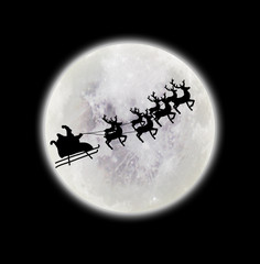 santa flying over full moon
