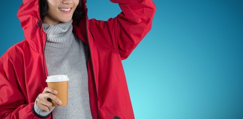 Poster - Composite image of woman in red jacket having coffee against
