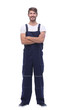 © ASDF - in full growth. smiling man in blue overalls