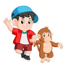 Little Boy Is Walking With A Monkey