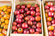 © Aleksandr Vorobev - Organic tamarillo tree tomato exotic fruit on display in wooden boxes at a street food market fair festival