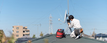 Antenna Installation Works At A Rooftop.