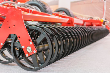 Poster - Agricultural machinery planter in the garage closed for storage until the next season